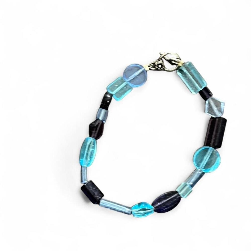 Blue and black glass bead